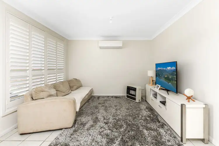 Second view of Homely semi-detached listing, 1/12 Cougar Place, Raby NSW 2566