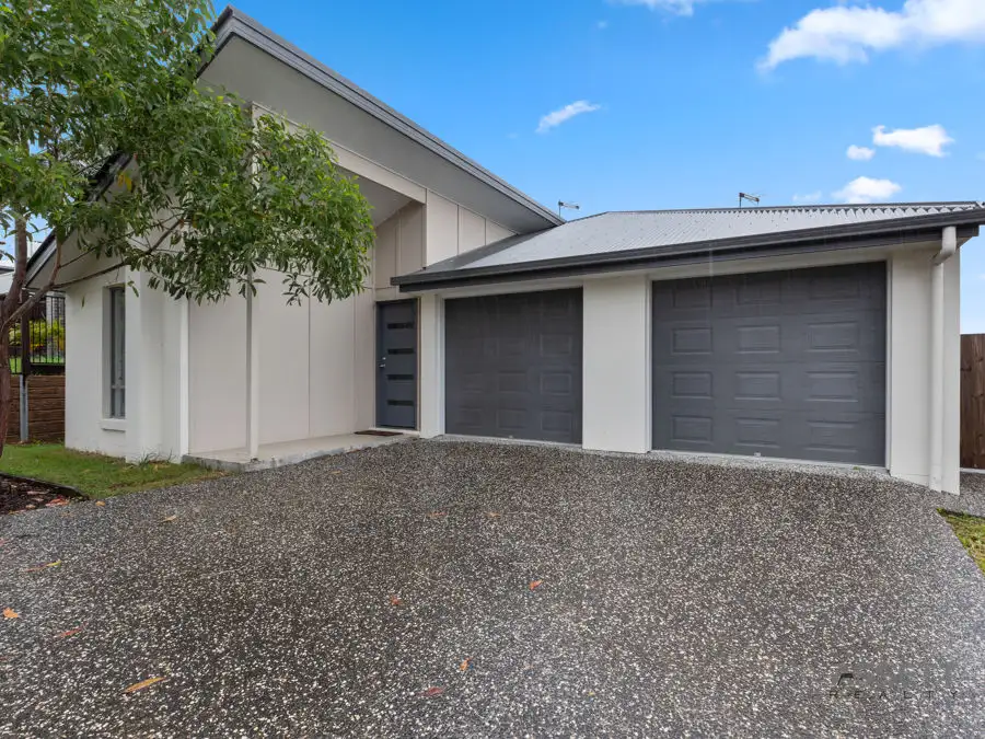 Main view of Homely semi-detached listing, 1 & 2/88 Alesana Drive, Goodna QLD 4300