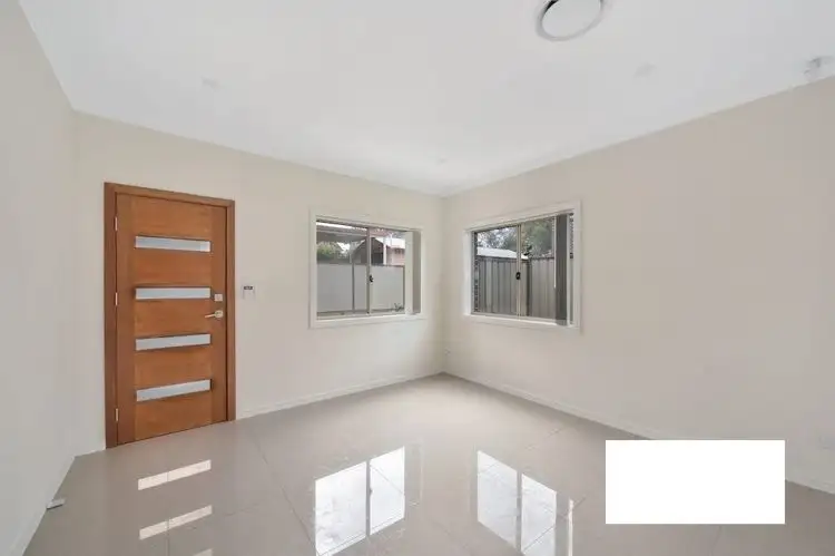 Second view of Homely townhouse listing, 2/16 Groundsel Avenue, Macquarie Fields NSW 2564
