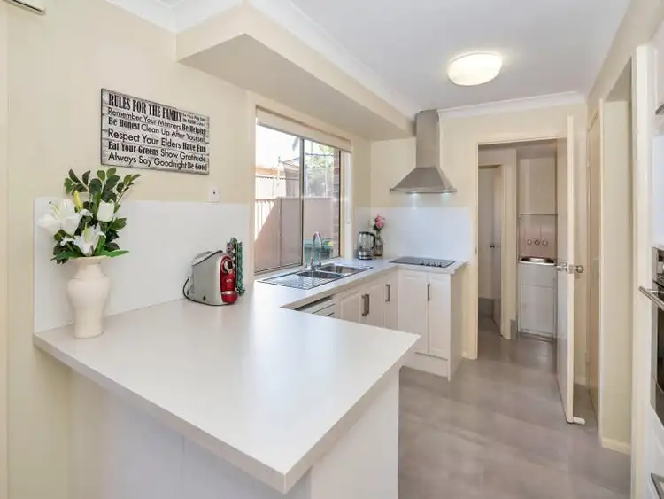 Main view of Homely townhouse listing, 1/33 Government Road, Labrador QLD 4215