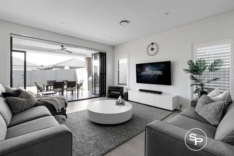 Second view of Homely house listing, 8 Bushpea Avenue, Denham Court NSW 2565