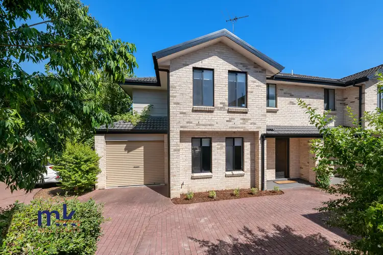 Main view of Homely townhouse listing, 1/2a Collis Place, Minto NSW 2566