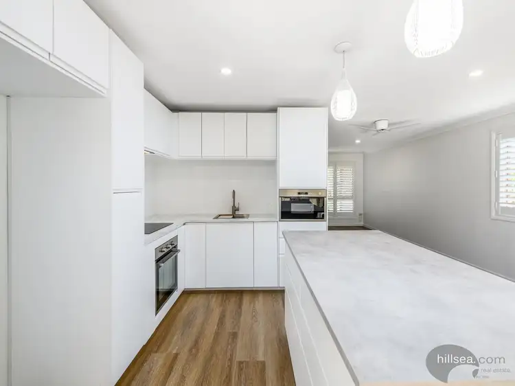 Main view of Homely townhouse listing, 1/1 Doyalson Place, Helensvale QLD 4212