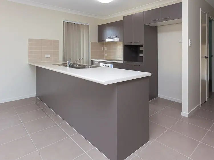 Second view of Homely semi-detached listing, 1/26 Knightsbridge Drive, Chuwar QLD 4306
