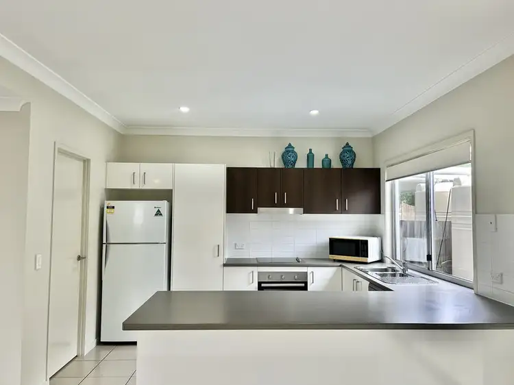 Third view of Homely townhouse listing, 2/9 Cavella Drive, Glen Eden QLD 4680