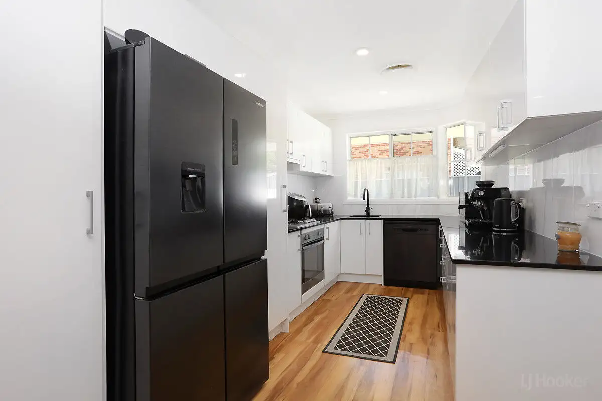 Main view of Homely villa listing, 9/27 Rain Tree Glen, Coombabah QLD 4216