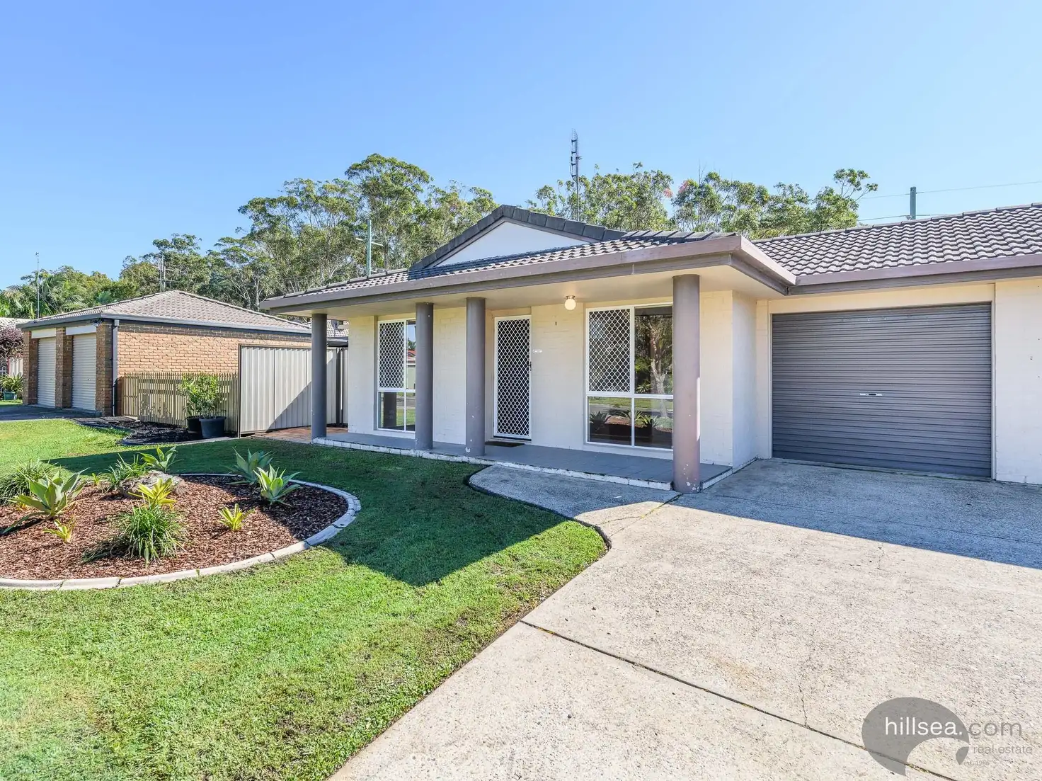 Main view of Homely semi-detached listing, 1/13 Liam Court, Labrador QLD 4215