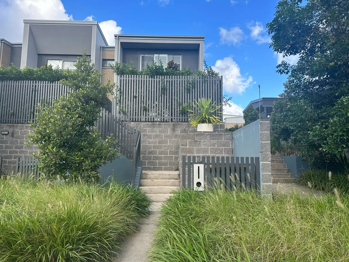 Main view of Homely townhouse listing, 45 Mckendry Drive, Cameron Park NSW 2285