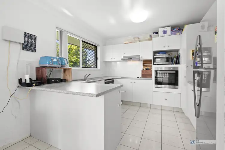Main view of Homely semi-detached listing, 1/7 Covent Gardens Way, Banora Point NSW 2486