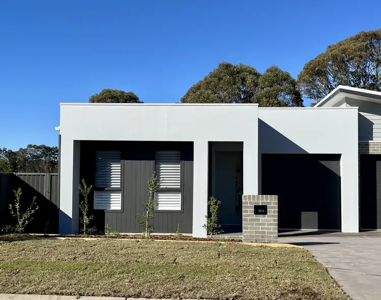 Main view of Homely semi-detached listing, 12a Wirraway Boulevard, Badagarang NSW 2540