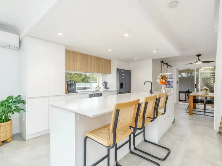 Main view of Homely semi-detached listing, 1/2 SNOWGUM Court, Burleigh Waters QLD 4220