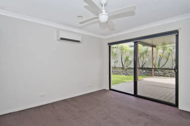 Third view of Homely house listing, 8 Howland Circuit, Pacific Pines QLD 4211