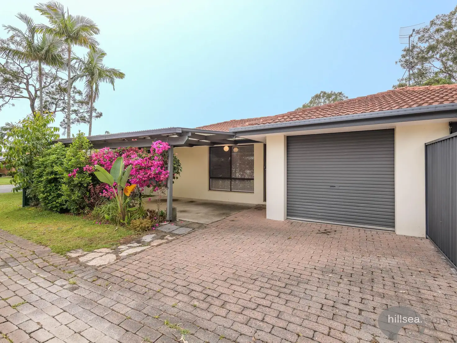 Main view of Homely semi-detached listing, 1/23 Morinda Way, Labrador QLD 4215