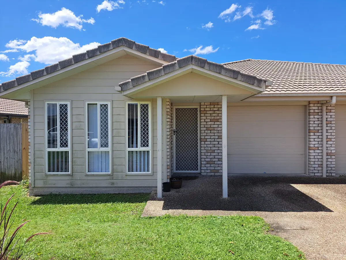 Main view of Homely semi-detached listing, 1/65 Water Fern Drive, Caboolture QLD 4510