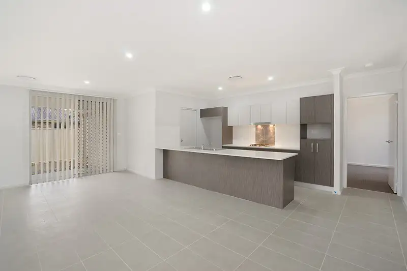 Main view of Homely villa listing, 2/63 Bangalow Street, Ettalong Beach NSW 2257