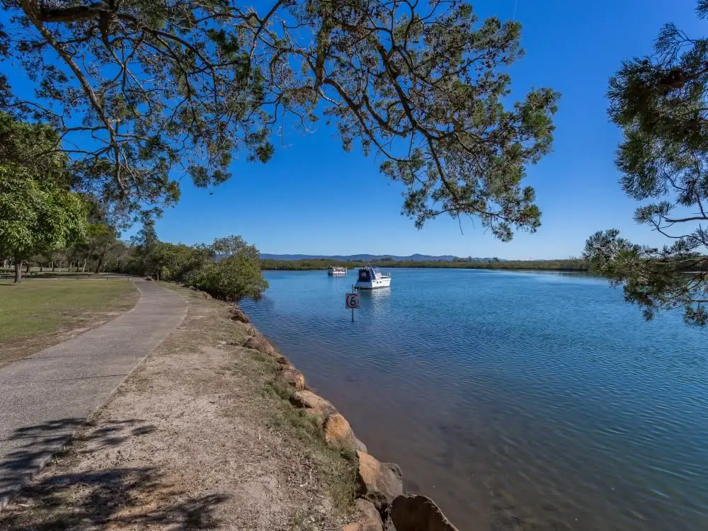 Main view of Homely semi-detached listing, 1/7 Woodgate Place, Paradise Point QLD 4216