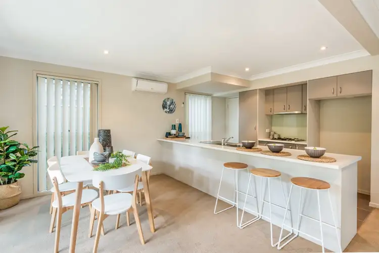 Main view of Homely townhouse listing, 1/24-26 Pemell Street, Wyoming NSW 2250