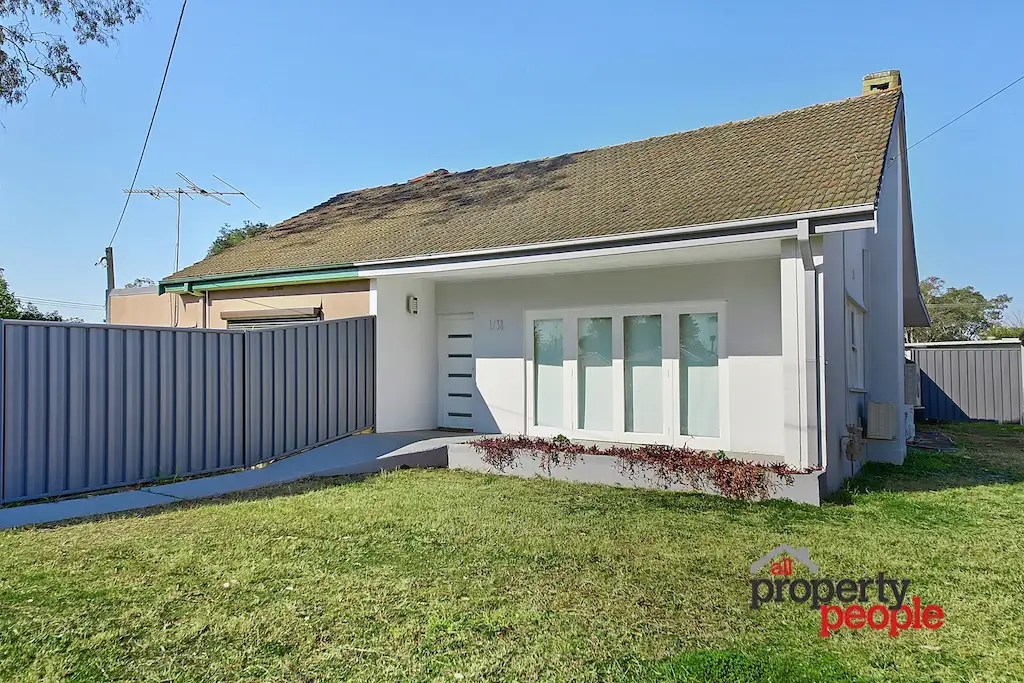 Main view of Homely semi-detached listing, 1/36-38 Surrey Street, Minto NSW 2566