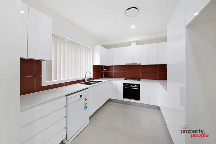 Second view of Homely townhouse listing, 3/16 Groundsel Avenue, Macquarie Fields NSW 2564
