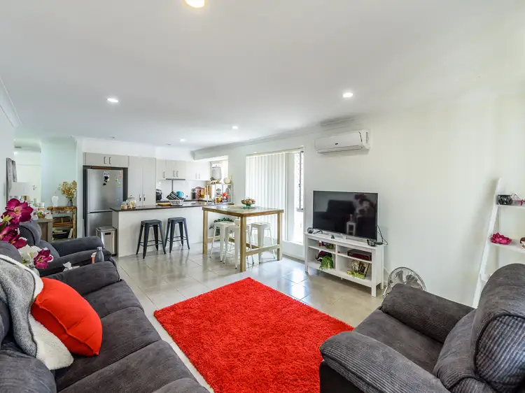 Main view of Homely semi-detached listing, 1/26 Benson Street, Ormeau QLD 4208