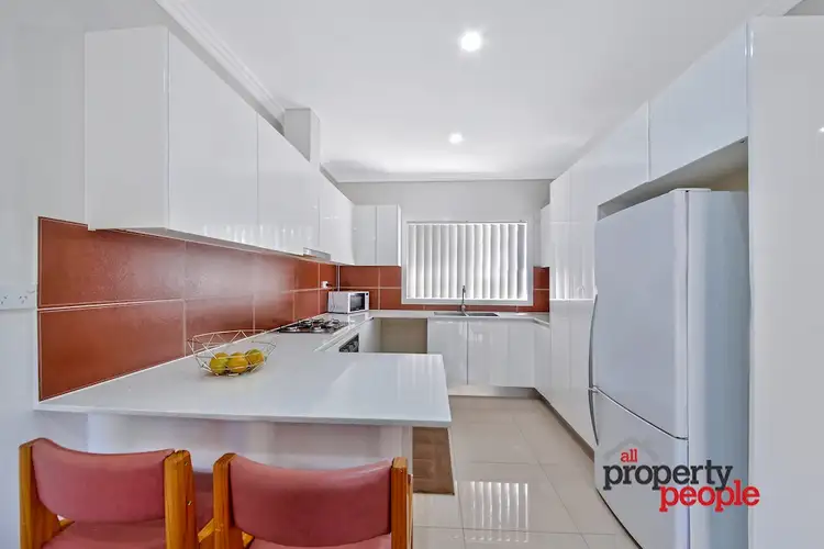 Second view of Homely townhouse listing, 1/16 Groundsel Avenue, Macquarie Fields NSW 2564