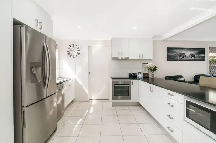 Main view of Homely townhouse listing, 105/601 Pine Ridge Road, Biggera Waters QLD 4216