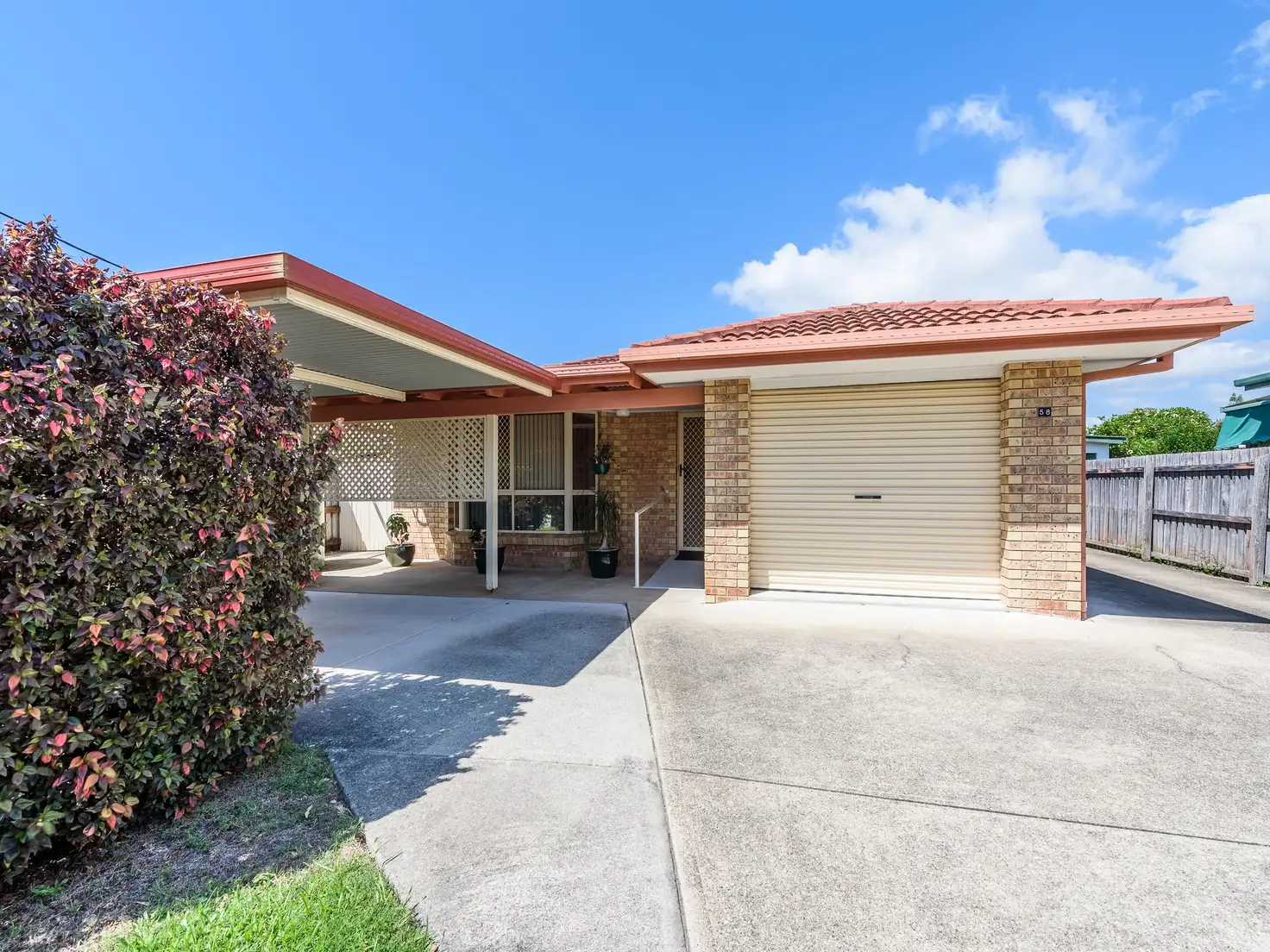 Main view of Homely semi-detached listing, 1/58 Milton Avenue, Paradise Point QLD 4216