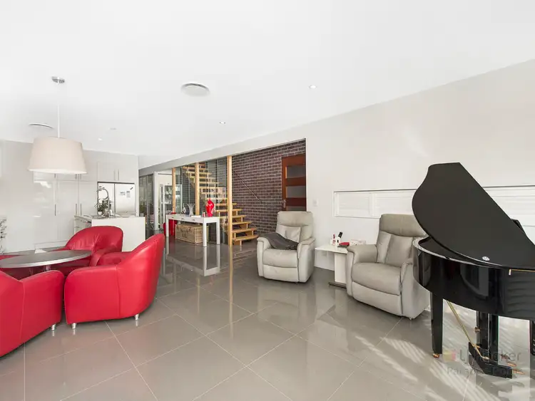 Main view of Homely semi-detached listing, 2/24 Drake Avenue, Paradise Point QLD 4216