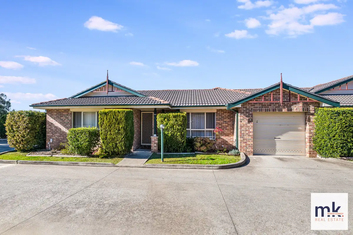 Main view of Homely villa listing, 8/95 Hurricane Drive, Raby NSW 2566