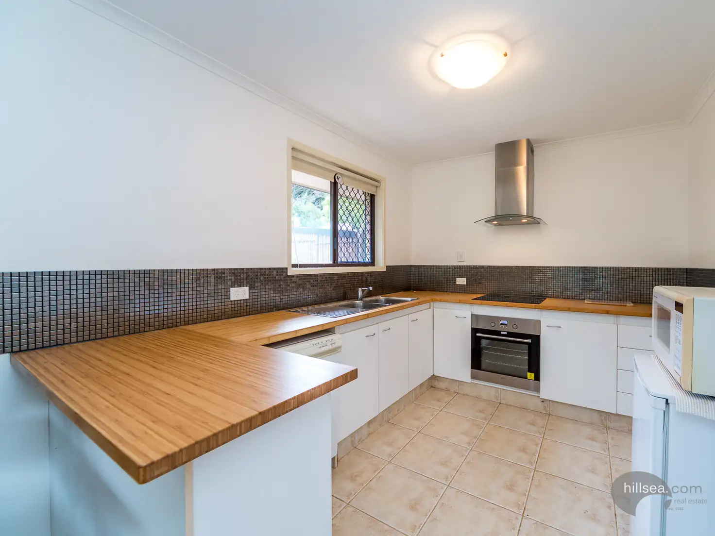 Main view of Homely semi-detached listing, 1/3 Botanical Drive, Labrador QLD 4215