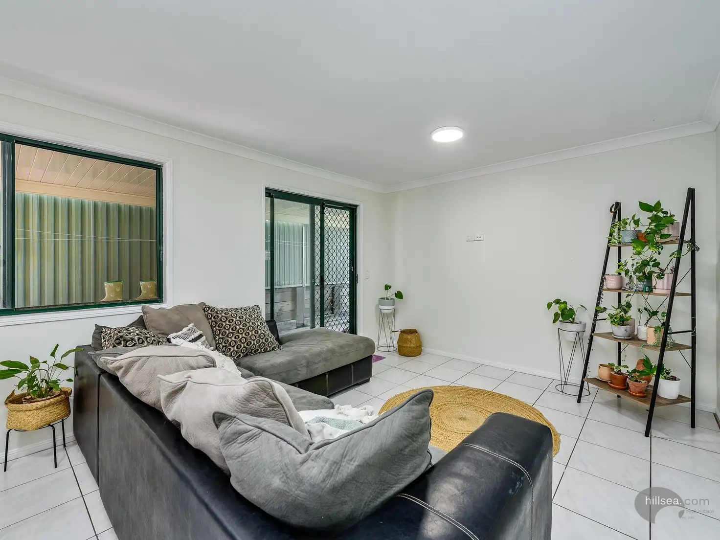 Main view of Homely semi-detached listing, 1/100 Greenacre Drive, Parkwood QLD 4214