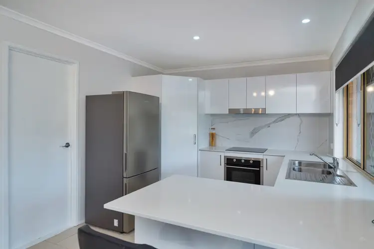 Main view of Homely semi-detached listing, 1/7 Vine Court, Oxenford QLD 4210