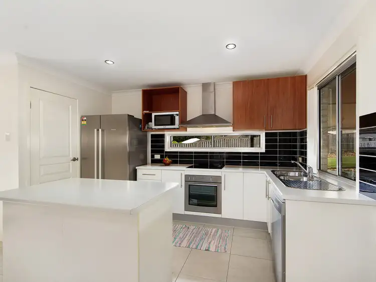 Second view of Homely house listing, 4 Kadie Place, Pacific Pines QLD 4211