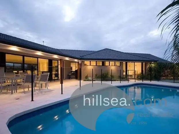 Main view of Homely house listing, 4 Wewak Avenue, Runaway Bay QLD 4216