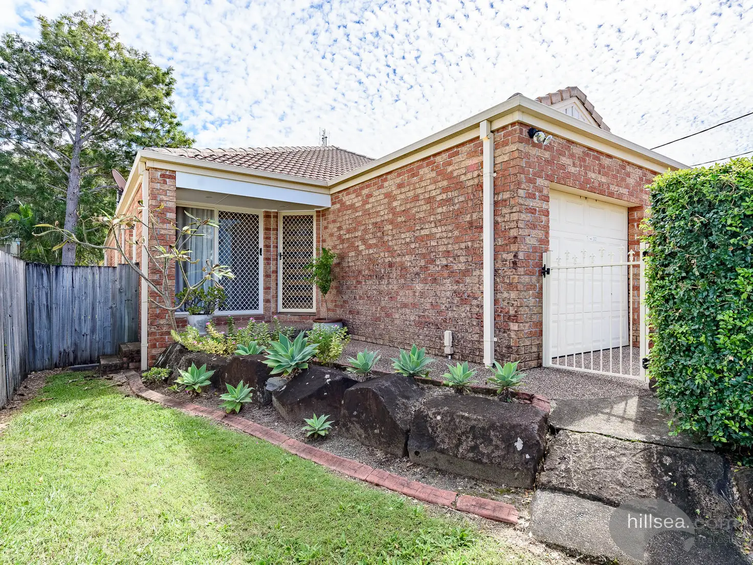 Main view of Homely semi-detached listing, 1/32 Huth Street, Labrador QLD 4215