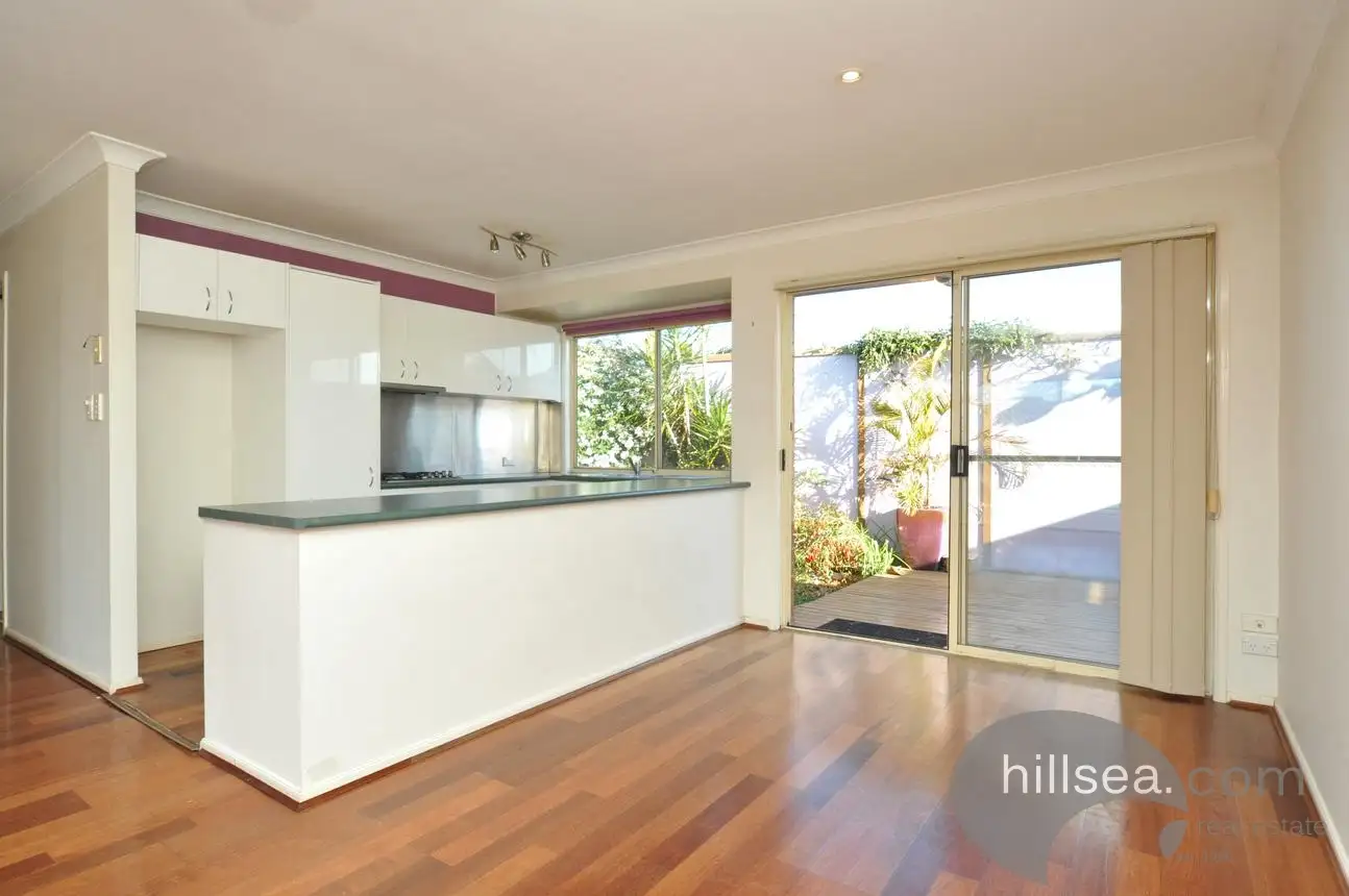 Main view of Homely semi-detached listing, 1/10 Crystal Reef Drive, Coombabah QLD 4216