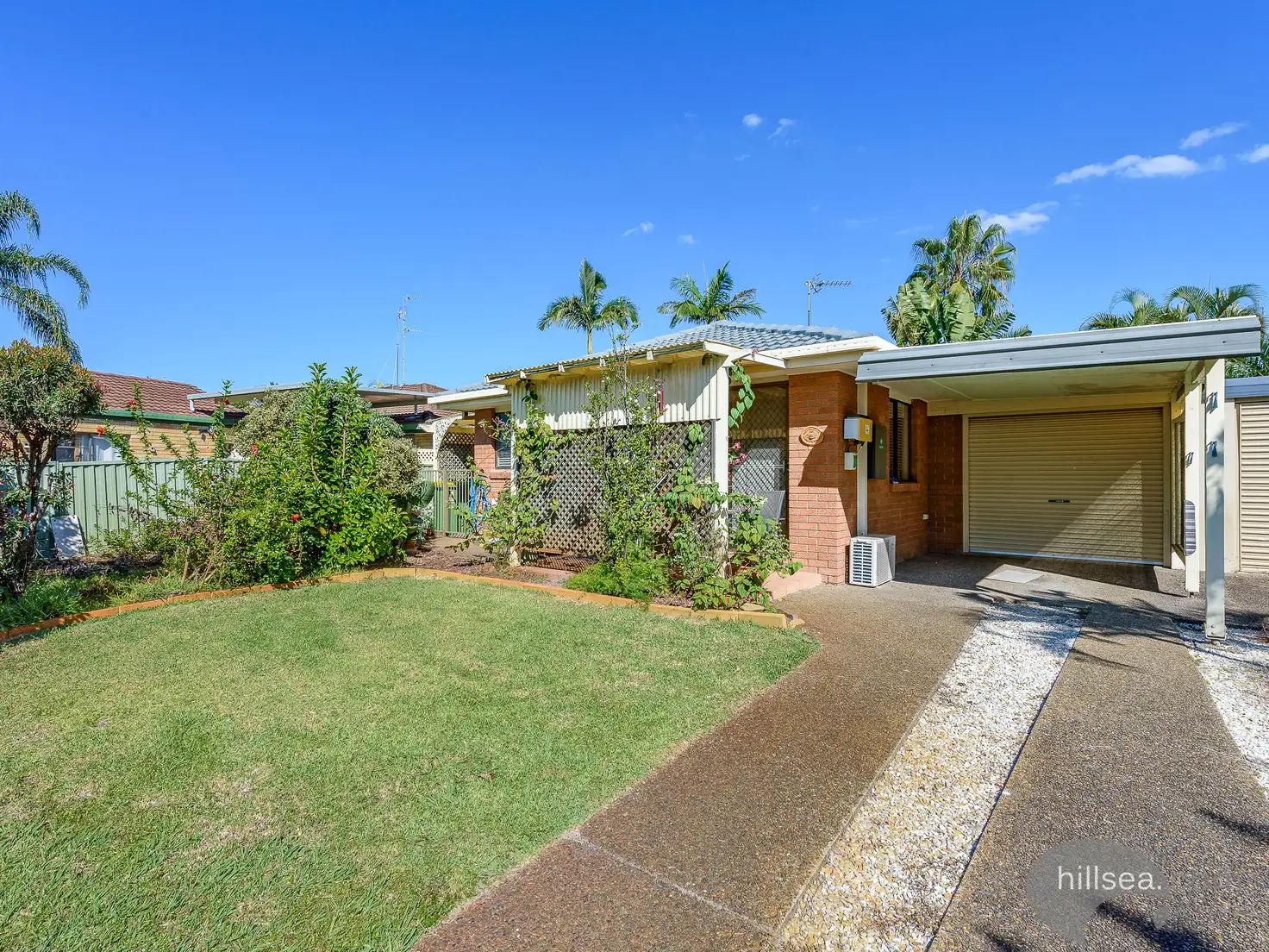 Main view of Homely semi-detached listing, 1/10 Warrie Close, Paradise Point QLD 4216