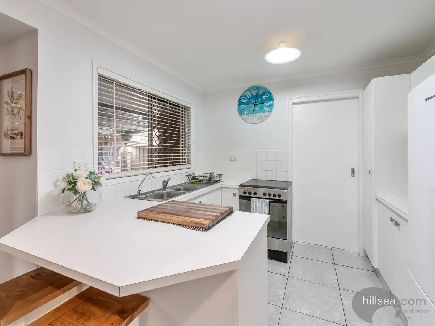 Main view of Homely semi-detached listing, 1/12 Avi Court, Labrador QLD 4215