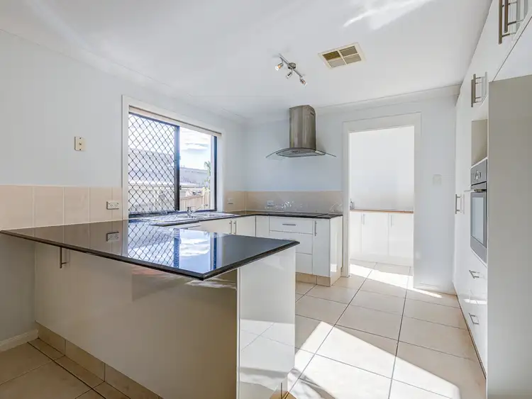 Second view of Homely semi-detached listing, 1/54 Codrington Circuit, Pacific Pines QLD 4211