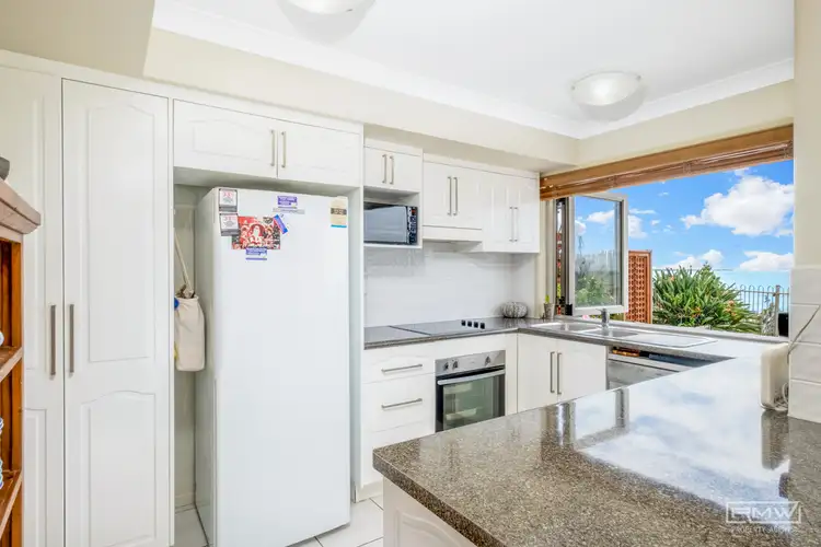 Third view of Homely house listing, 7 Wattle Grove, Cooee Bay QLD 4703