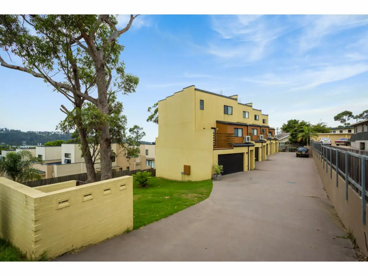 Main view of Homely townhouse listing, 1/8 Reid Street, Merimbula NSW 2548