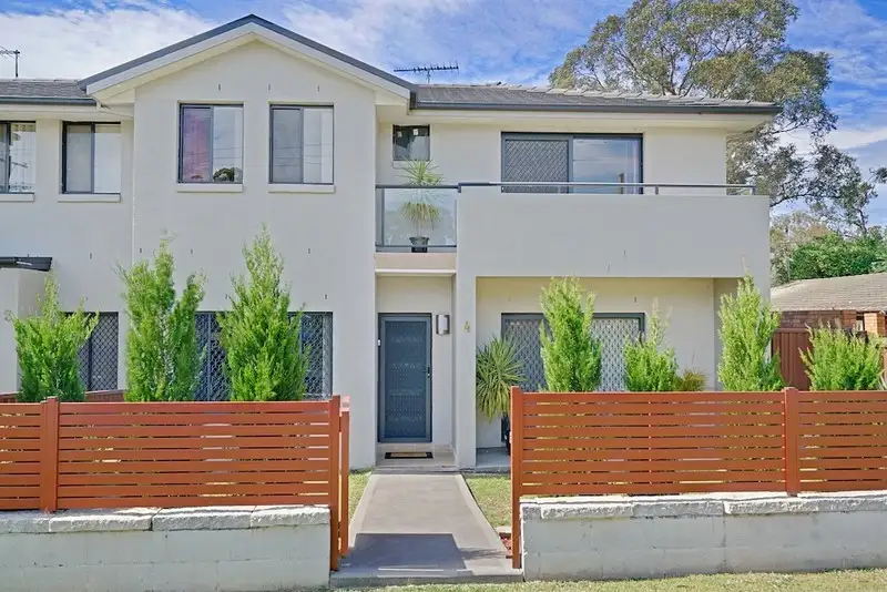 Main view of Homely townhouse listing, 4/16-20 Myee Road, Macquarie Fields NSW 2564