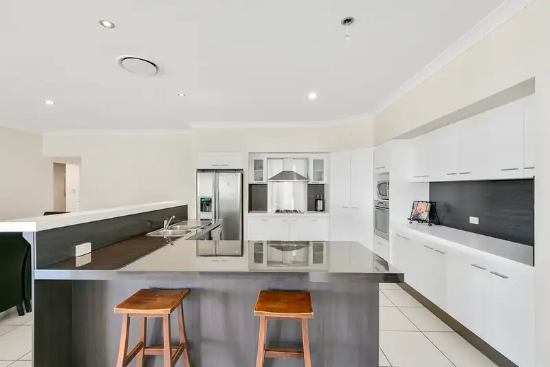 Main view of Homely house listing, 31 Harmsworth Road, Pacific Pines QLD 4211