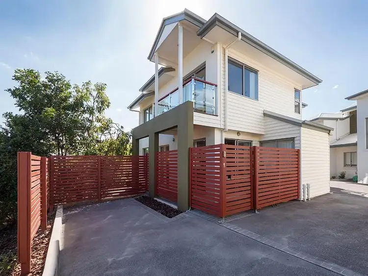 Main view of Homely townhouse listing, 1/18 Horsington Street, Morningside QLD 4170
