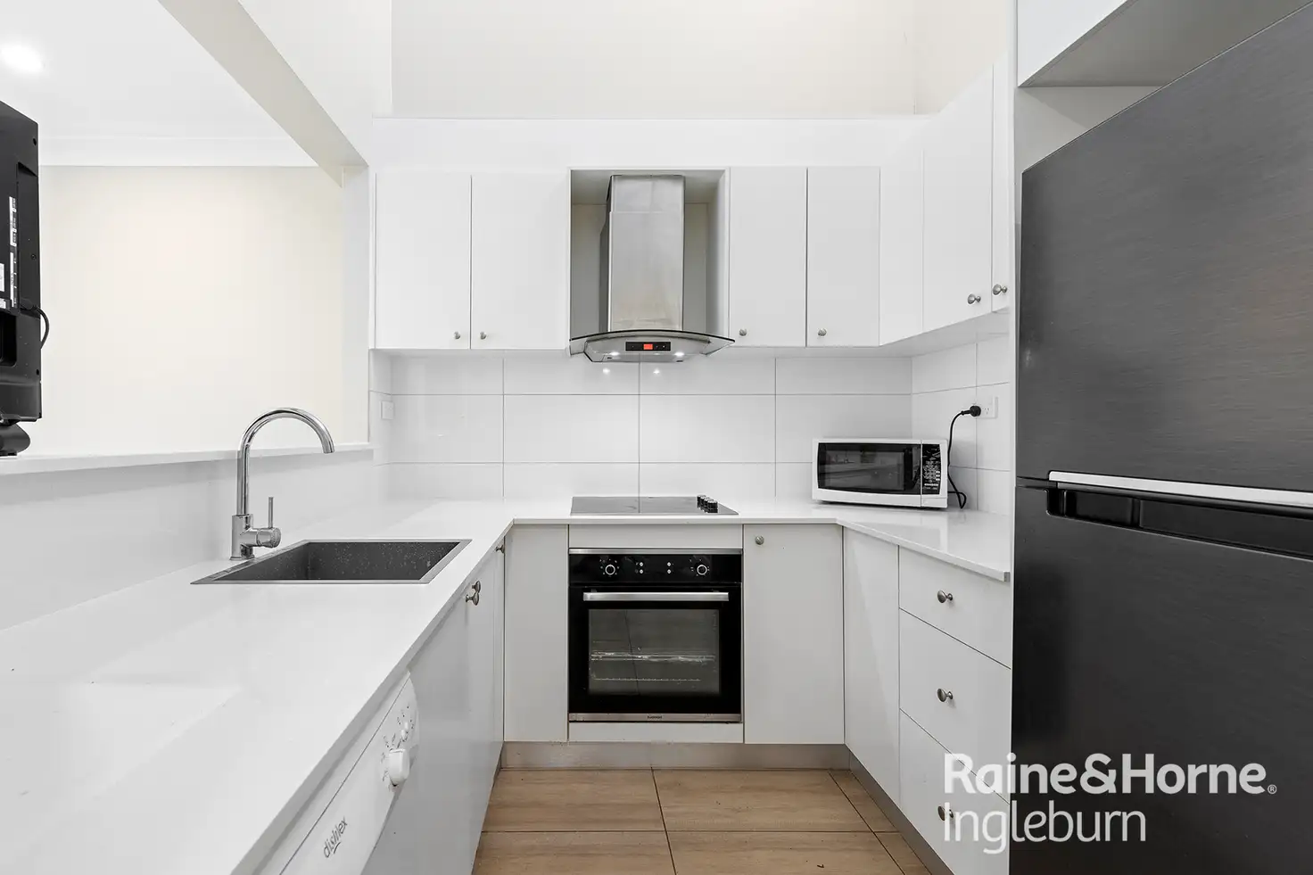 Main view of Homely villa listing, 2/50 Trafalgar Street, Glenfield NSW 2167
