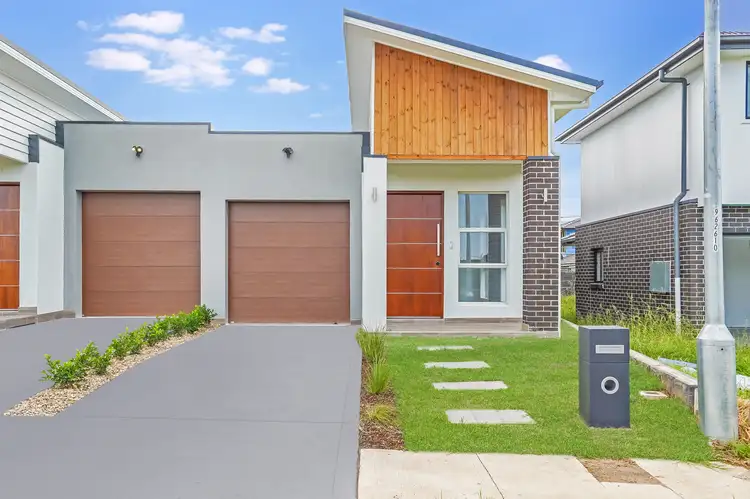Main view of Homely semi-detached listing, 23b Long Reef Circ, Gregory Hills NSW 2557