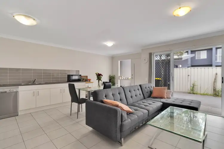 Main view of Homely townhouse listing, 2/1A Woodbury Park Drive, Mardi NSW 2259