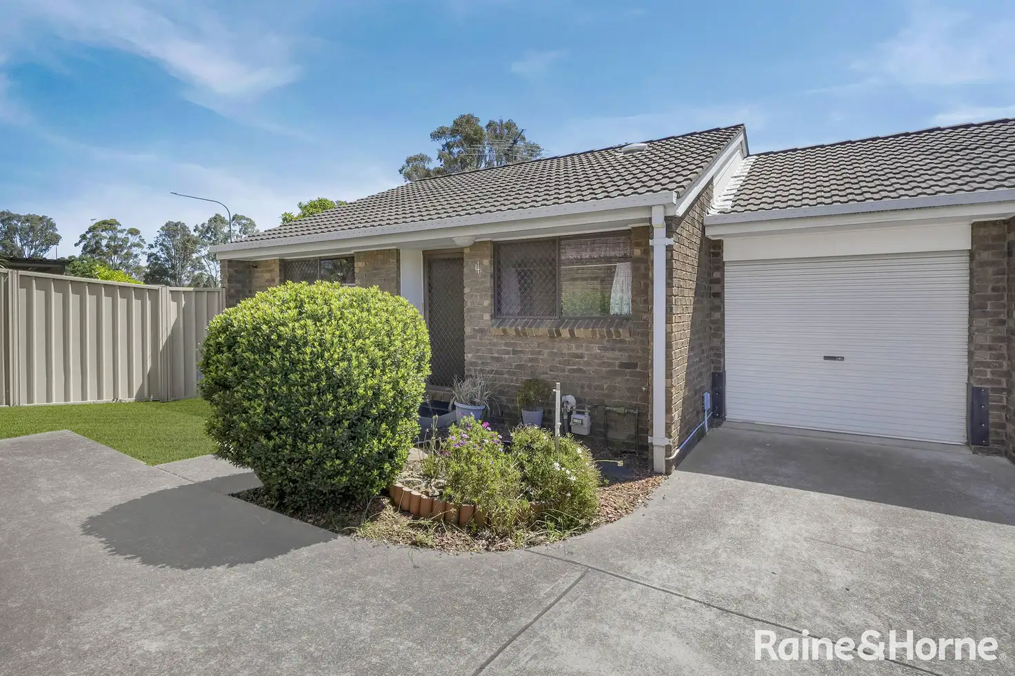 Main view of Homely villa listing, 4/16 Bensley Road, Macquarie Fields NSW 2564