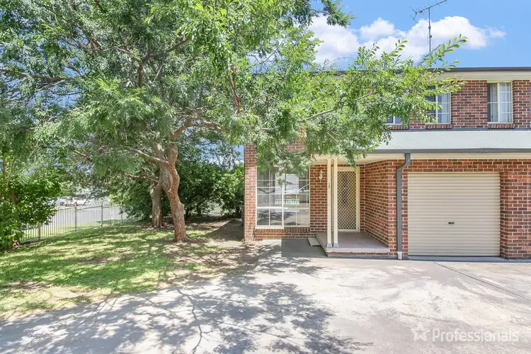 Main view of Homely townhouse listing, 1/1A McIntosh Street, The Oaks NSW 2570