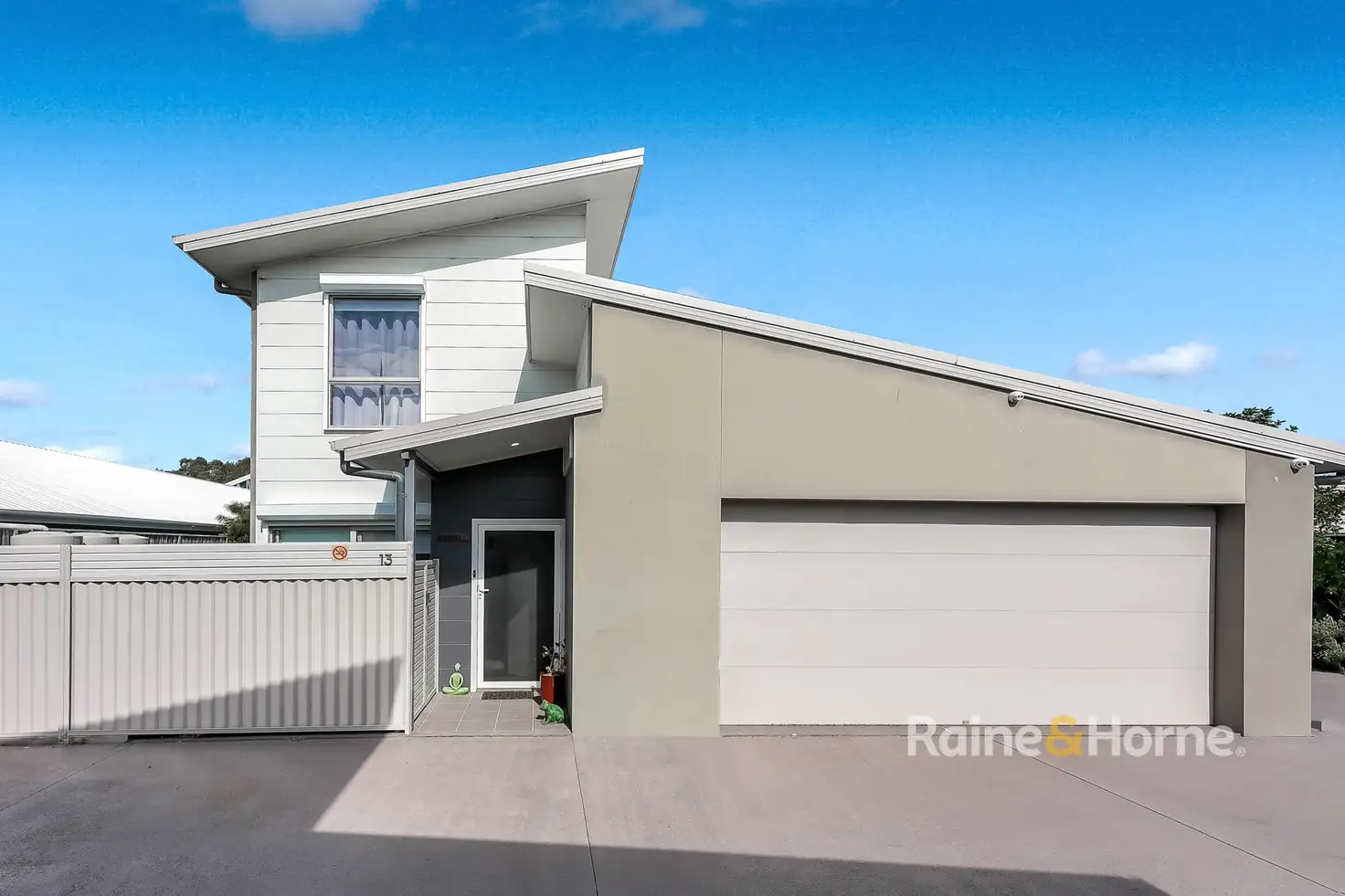 Main view of Homely townhouse listing, 13/4 Everglades Crescent, Woy Woy NSW 2256